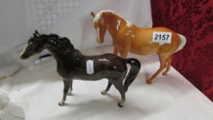 Two Beswick horses.