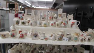 Fifty pieces of assorted Carlton ware crested china, various crests,