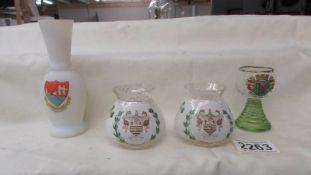 Four items of crested glass.