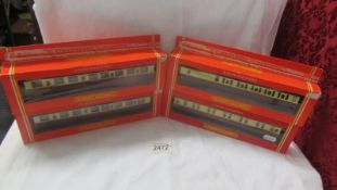 Four boxed Hornby 'BR' EX 'LNER, 2 x R.409, R410, R419, coaches and sleeping car.