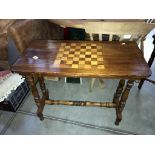 An Edwardian mahogany table with inlaid chess board top