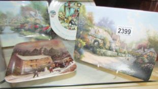 Three Thomas Kinkade collector's plates, a Davenport collector's plate and one other.