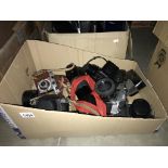 A mixed lot of cameras and accessories and lens