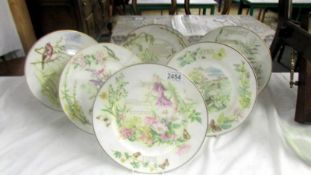 Six Edwardian lady plates decorated with birds, January - June.