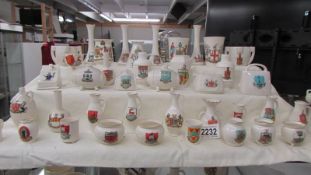 Forty pieces of W H Goss crested china.