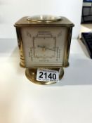 An Angelus circa 1950 Swiss gilt brass portable clock/weather station.