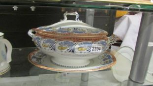 A large 19th century soup tureen with cover and stand.