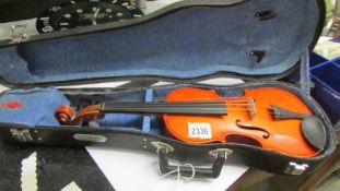 A three quarter size Skylark violin.
