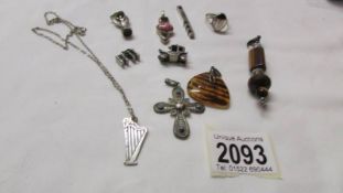 A quantity of silver pendants, ring, charms etc, mostly stone set,