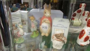 Three boxed Royal Albert World of Beatrix Potter figures being Mrs Tiggy Winkle,