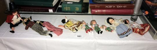 A selection of vintage costume dolls,