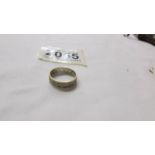 A 9ct gold eternity ring, size J half.