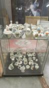 Fifty pieces of assorted crested china, various crests and makers.