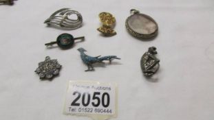 A mixed lot of brooches including turquoise set pheasant, micromosaic, monkey etc.