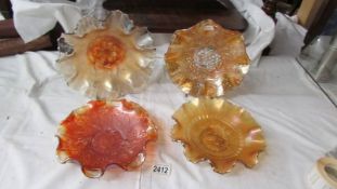 Four Carnival glass marigold bowls - Wild flower, Northwood good luck bowl,