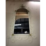 A vintage painted wrought iron frame mirror,