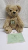 A limited edition Merrythought bear with certificate, 111/1931.
