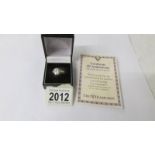 A 9ct gold ring set large simulated "Tru Diamond" with certificate, size T.