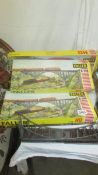 Five boxes of Faller HO gauge railway buildings and bridges.