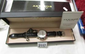 A boxed as new Akribos XXVI chronograph movement wrist watch.
