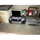 A quantity of electronic items including Epsom printer, VHS and DVD players,