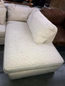 A cream fabric covered single end sofa