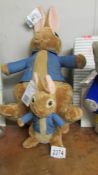 A large Peter Rabbit and a smaller example.