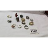 A mixed lot of white and yellow metal dress rings.