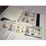 14 limited edition Beatrix Potter 50p coin covers (10 in album and 4 loose)