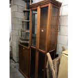 A 2 door display cabinet with bevel glass