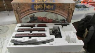 A Hornby R1025 Harry Potter and the Philosopher's Stone Hogwarts Express train set.