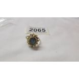 An 18ct gold ring set opal, size O half. 3.5 grams.