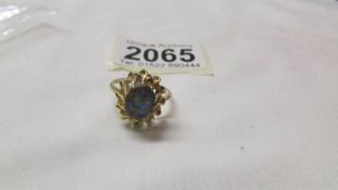 An 18ct gold ring set opal, size O half. 3.5 grams.