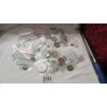 A collection of coins including silver, Victoria, Churchill crowns etc.