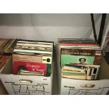 A quantity of LP's and singles in 2 boxes