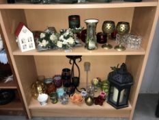 2 shelves of candle holders etc