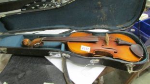 An old cased violin.
