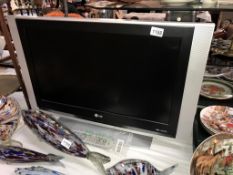 A 27" LG tv with remote control