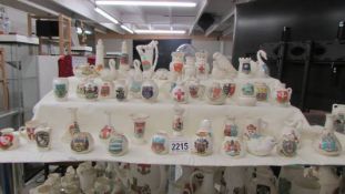 Fifty pieces of assorted crested china, various crests,