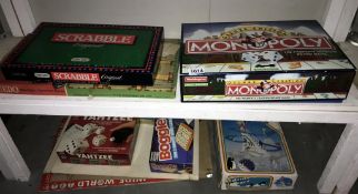 2 shelves of assorted board games (unchecked)