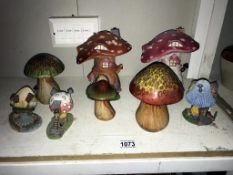 A quantity of mushroom/toadstool ornaments