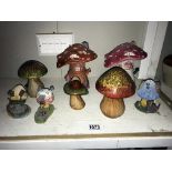 A quantity of mushroom/toadstool ornaments