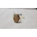 An 18ct gold cameo ring, stamped 750, 122VA, size N. 5.3 grams.