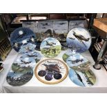 A good lot of collectors plates on RAF includes Royal Doulton plus a wooden plate rack and set of