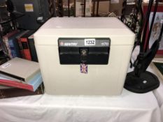 A Sentry 1770 safe box/document box with key