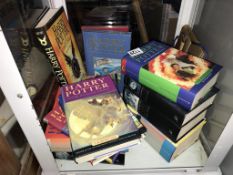 A collection of Harry Potter books including new and sealed copies of The Philosophers stone,