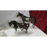 Two Beswick horses.