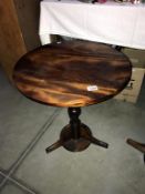 A round mahogany side table