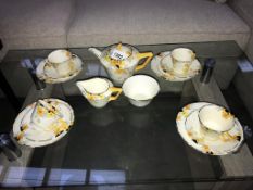 A Crown Ducal Sunburst art deco tea set ****Condition report**** 2 cups have varying
