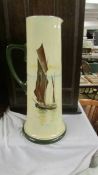 A tall Royal Doulton jug decorated with sailing boats, (a/f, hairline cracks to top).